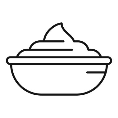 Lezzetli krema sosuyla dolu bir kase yenilmeyi bekliyor.