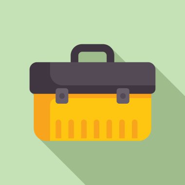 Sarı araç kutusu yeşil arka planda duruyor, uzun bir gölge bırakıyor.