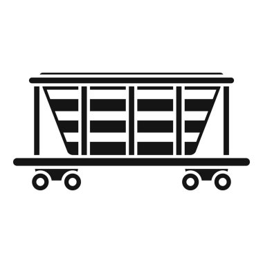 Boş bir yük vagonunun siyah silueti rayların üzerinde duruyor.