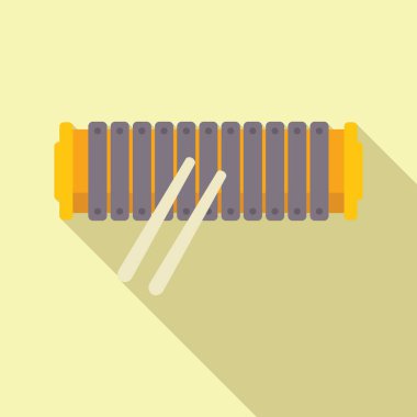 Tokmaklı ksilofon bir yüzeyde duruyor, çalınmaya hazır.