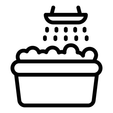 Duş başlığı küvete su dökerek köpük, kişisel hijyen ve temizlik kavramı yaratıyor.