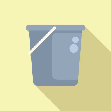 Saplı boş temizlik kovası sarı arka planda uzun bir gölge bırakıyor