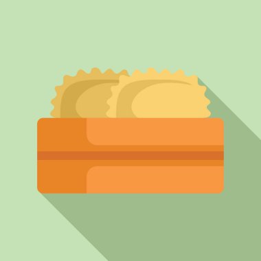 Ravioli makarnası turuncu bir karton kutunun içinde lezzetli bir yemek için pişirilmeye ve yenmeye hazır.