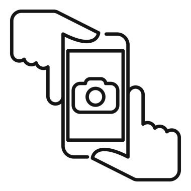 İki el akıllı telefon tutuyor, kamera uygulaması açıkken fotoğraf çekiyor.