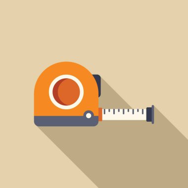 Turuncu ve gri mezura açık kahverengi arkaplanda uzun bir gölge oluşturuyor