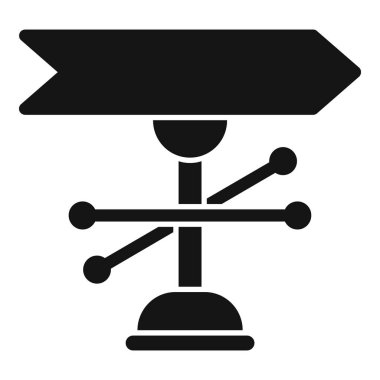 Bir sokak levhasının siyah silueti rüzgar göstergesi ile yönü gösteriyor