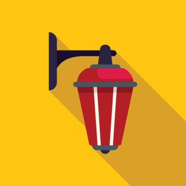 Kırmızı duvar lambası sarı arka planda uzun bir gölge bırakıyor.