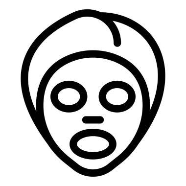 Kadın yüz maskesi takarken güzellik tedavisinden zevk alıyor.