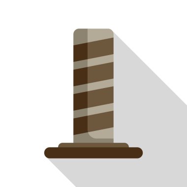 Çizgili park bollard bir üste duruyor, uzun bir gölge bırakıyor.