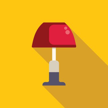 Kırmızı masa lambası, parlak sarı bir duvara uzun bir gölge düşürüyor ve kalın ve grafik bir kompozisyon oluşturuyor.