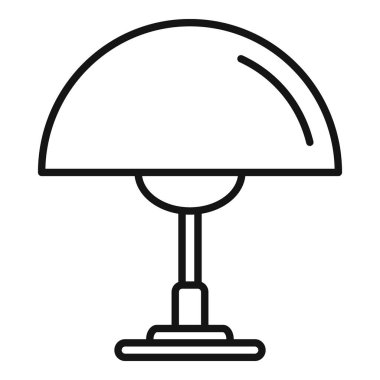 Modern masa lambası bir masa üzerinde duruyor, bir ev tasarımı elementi olan ışığı sağlıyor.