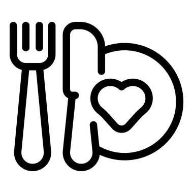 Kalp şekli bir tabakta, çatal ve bıçağın yanında, yiyeceğe olan sevgisini ifade ediyor.