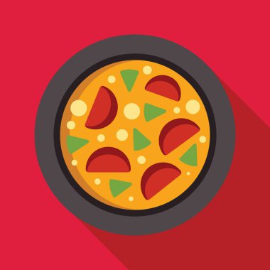 Geleneksel paella yemeği uzun gölgeli yuvarlak bir tabakta servis edilir.