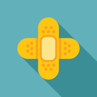 Sarı yapışkan bandaj haç şeklinde, ilk yardım ve yara bakımını temsil ediyor.