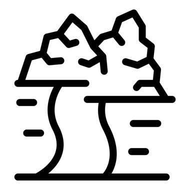 Kar ve kayalardan oluşan çığ bir dağdan yola düşüyor.