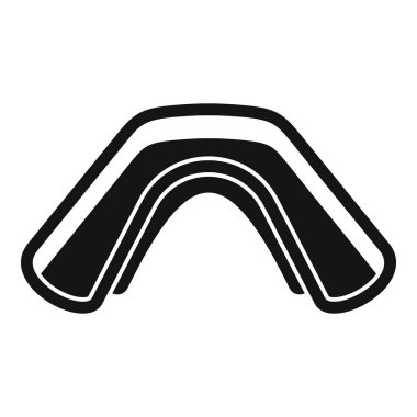 Eğitim sırasında dişleri koruyan siyah bir ağız koruyucusu.