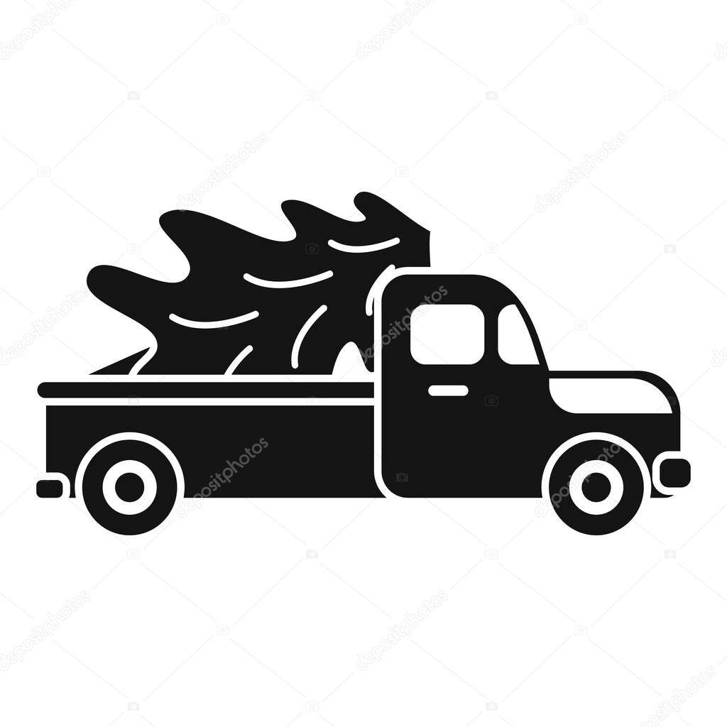 Classic pickup truck carrying a freshly cut evergreen pine tree, embodying the spirit of christmas