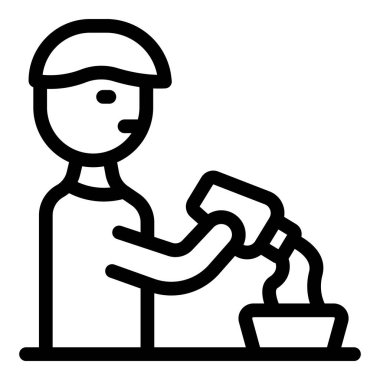 Bahçıvan bitkisini gübreliyor. Güçlü ve sağlıklı olması için.