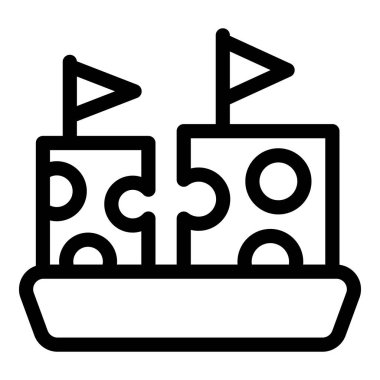 Bayraklı iki yapboz parçası tepside bir kale oluşturuyor, eğlenceli öğrenme ve gelişme kavramını sembolize ediyor.