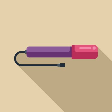 Bisiklet pompası bej bir arka planda yatay olarak yatar, uzun bir gölge bırakır.