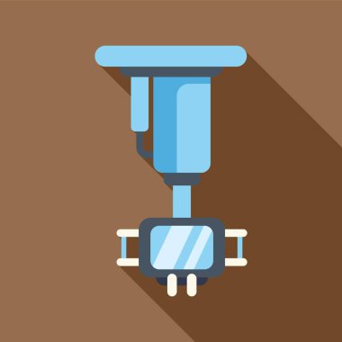 Tavandan sarkan tıbbi teçhizat kahverengi arka planda uzun bir gölge bırakıyor.