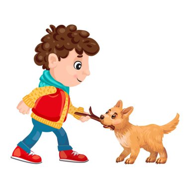 Mutlu çocuk ağaç dalı kullanarak köpeğiyle yakalamaca oynuyor.