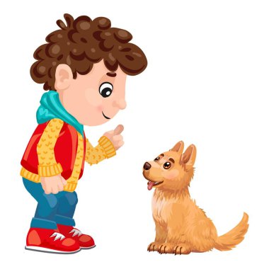 Küçük çocuk, küçük köpeğini parmağıyla işaret ederek eğitiyor.