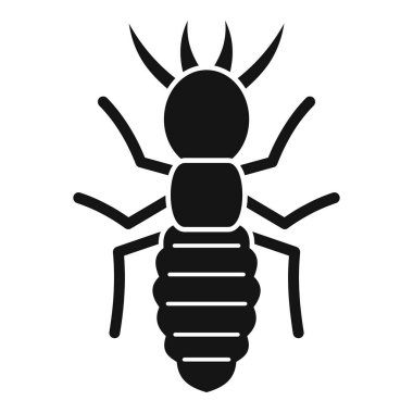 Büyük bir termit böceğinin siyah silueti büyük bir karnıyla bacaklarını açıyor.