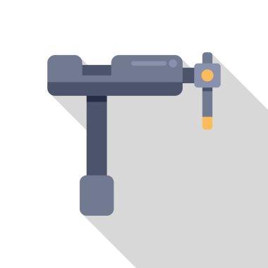 Metal masa mengene klempleme aracı duruyor, uzun bir gölge bırakıyor