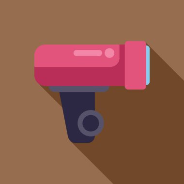 Pembe el feneri kahverengi arka planda uzun bir gölge bırakıyor.