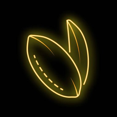 Parlak sarı neon tabela siyah arka planda parlayan kabuğu açık bir fıstığı temsil ediyor.