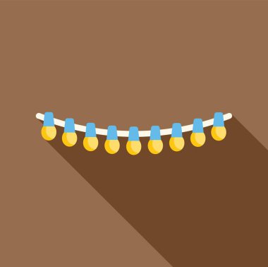 Işık dizisi bir kabloya asılı, neşeli bir atmosfer yaratıyor.