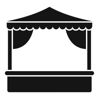 Perdeleri olan ve mal satmak için tezgahı olan bir sokak marketi.