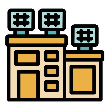 Büyük bina gece stadyum ışıklarıyla aydınlanıyor, parlak ve enerjik bir atmosfer yaratıyor.