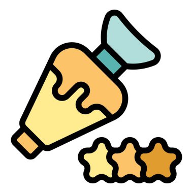 Pasta torbası pasta süslemesi için yıldız şekilleri oluşturmak için krema sıkıyor.