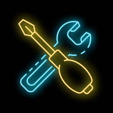 Çapraz ingiliz anahtarı ve tornavidayı simgeleyen neon işareti siyah bir arka planda parlıyor.