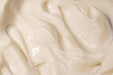 Güzellik kremi dokusu. Kozmetik losyon arka planı. Kremalı cilt ürünleri yakın çekim.