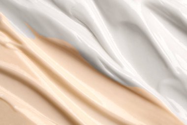 Güzellik kremi dokusu. Kozmetik losyon arka planı. Kremalı cilt ürünleri yakın çekim.