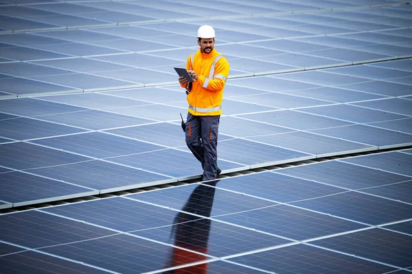 Professional Worker Using Digital Tablet Walking Rooftop Checking Solar Panel — ストック写真