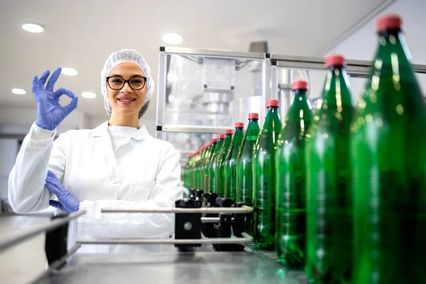 Female Technologist Holding Okay Sign Approving Production Beverage Bottling Factory — Stockfoto