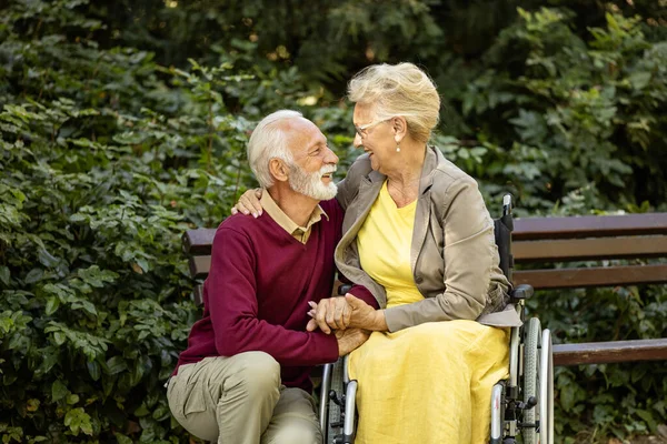 Senior Man Taking Care Elderly Woman Wheelchair Showing Love Respect Stock Picture