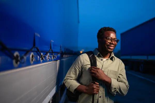 stock image Happy truck driver coming to work night shift.