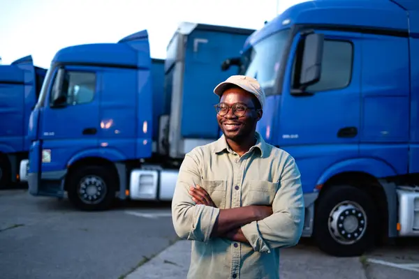 stock image Portrait of professional truck driver holding his arms crossed.