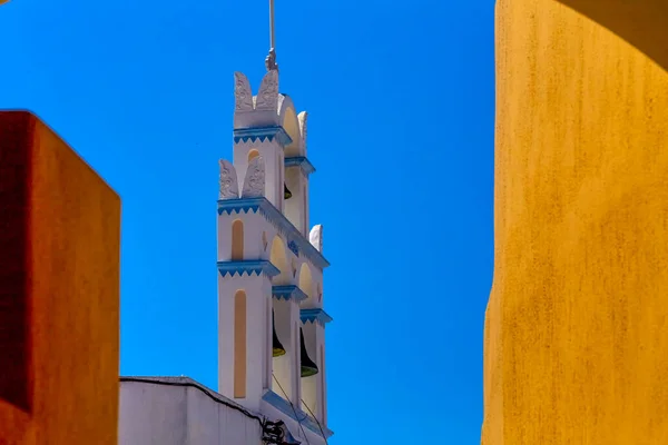 stock image A vertical shot of church bells in Emporio village. Santorini, Greece. Church of Our Lady Messani or Church of Old Panaghia. This church built during the 16th century