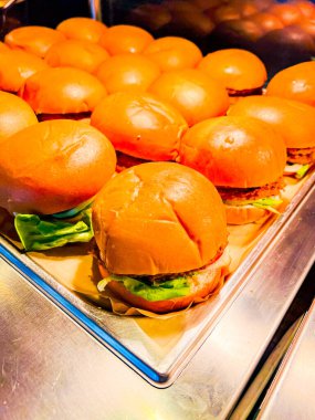 Catering american style - plenty of hamburgers. hamburger is food consisting of fillings - usually patty of ground meat, typically beef - placed inside sliced bun or bread roll.