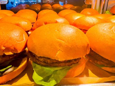 Catering american style - plenty of hamburgers. hamburger is food consisting of fillings - usually patty of ground meat, typically beef - placed inside sliced bun or bread roll.