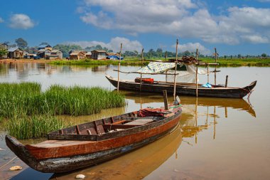 Poor Cambodians living in poverty along a river in South East Asia