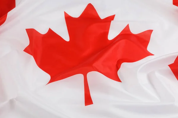 stock image The official flag of Canada.  With the famous red Maple Leaf.  North America