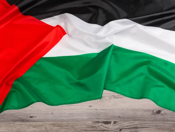 巴勒斯坦棕榈旗 Palsetine Flag 是一个正式名称为 中东巴勒斯坦国 的国家 有着木制背景和复制空间 — 图库照片