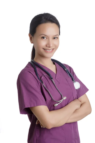 아름다운 아시아 보라색 수술복을 복제품 배경에 고립되어 간호사 — 스톡 사진